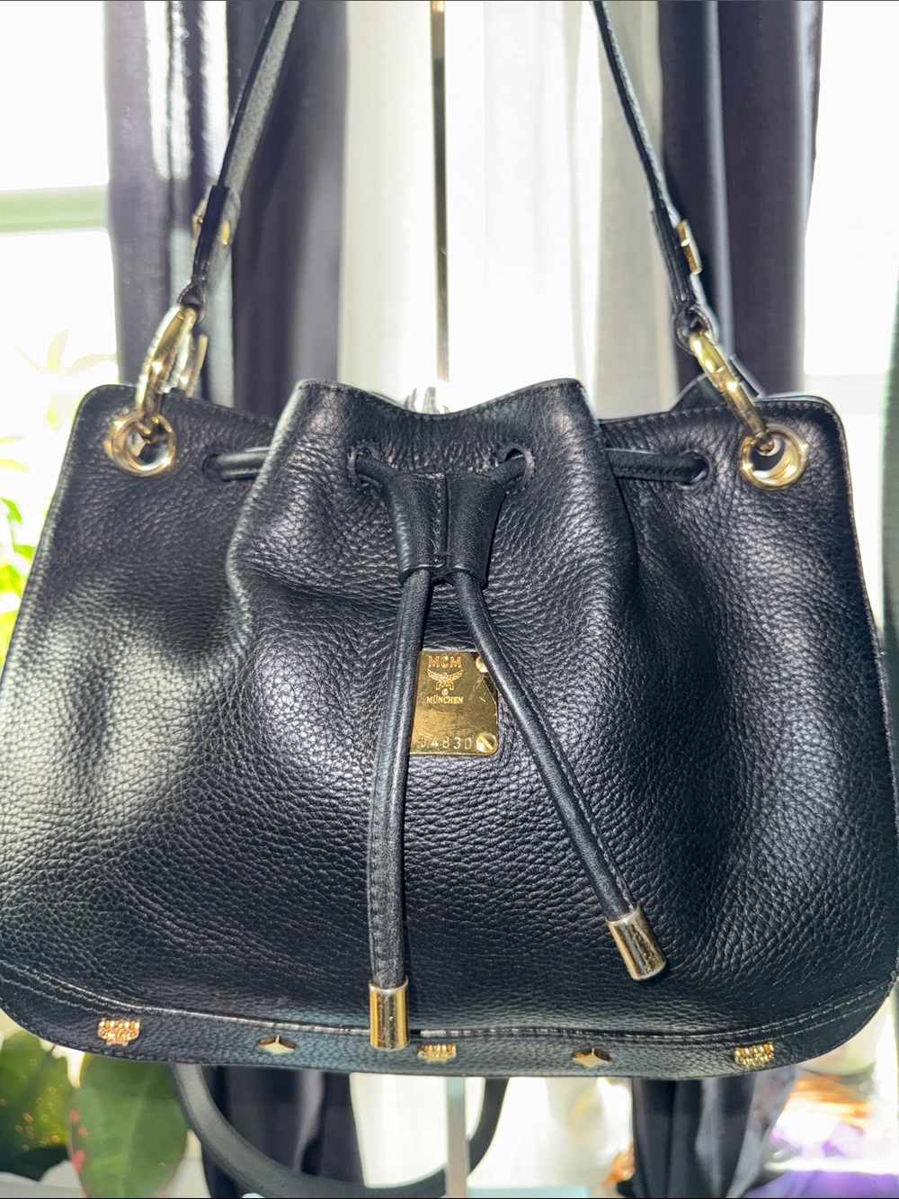 MCM Black Pebbled Leather Drawstring Shoulder Crossbody Bag with Gold Hardware